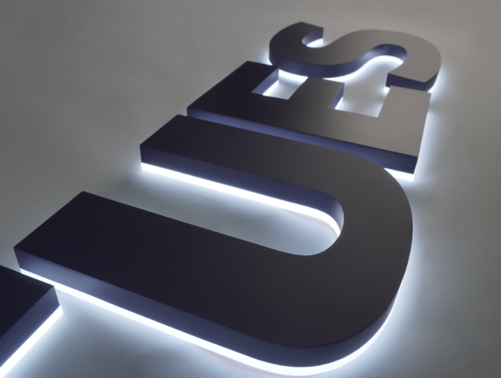 close-up of a bespoke illuminated letter showing its finish and lighting