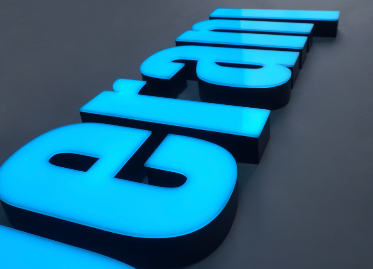 Blue front-lit acrylic letters illuminated with LEDs